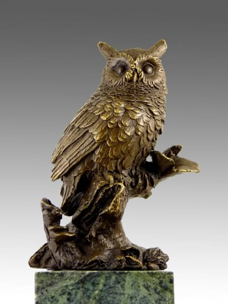 Beautiful bronze owl seated on a branch sculpture created by Milo